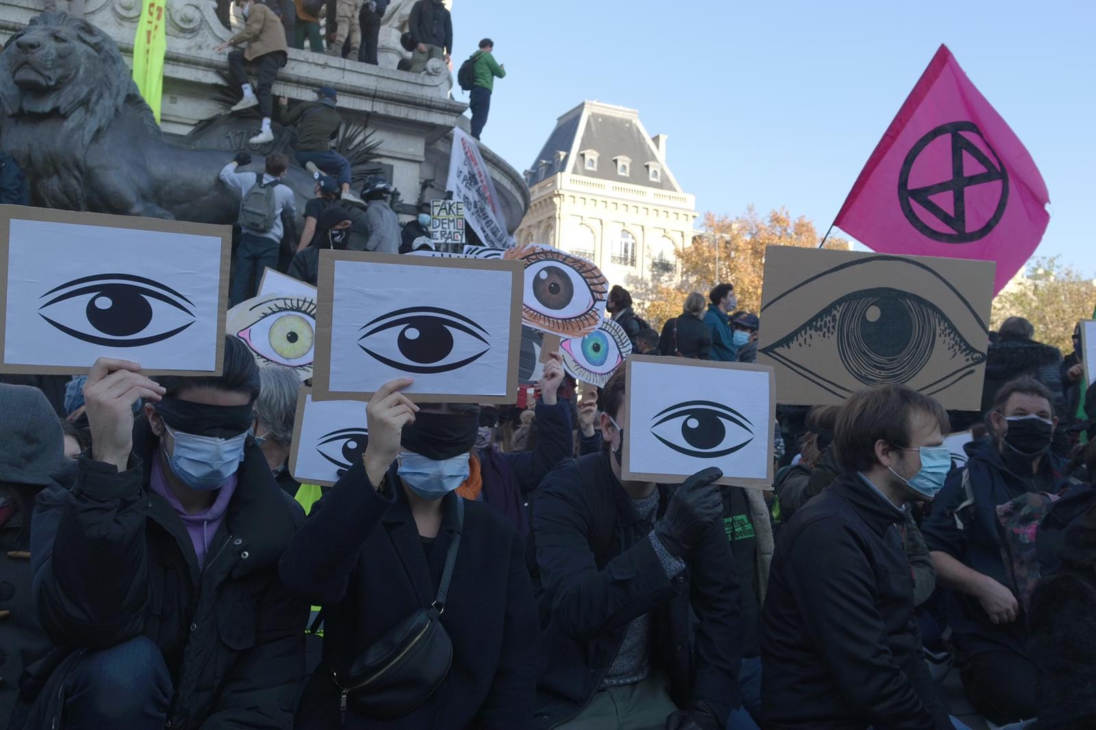 Rebels & other activists on Place de la République demonstrate against the new authoritarian and unjust Global Security Bill.