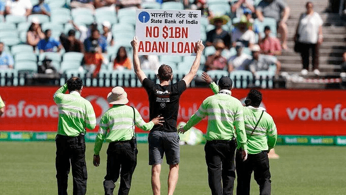 A protester in the Sydney Cricket Ground during a match between India & Australia